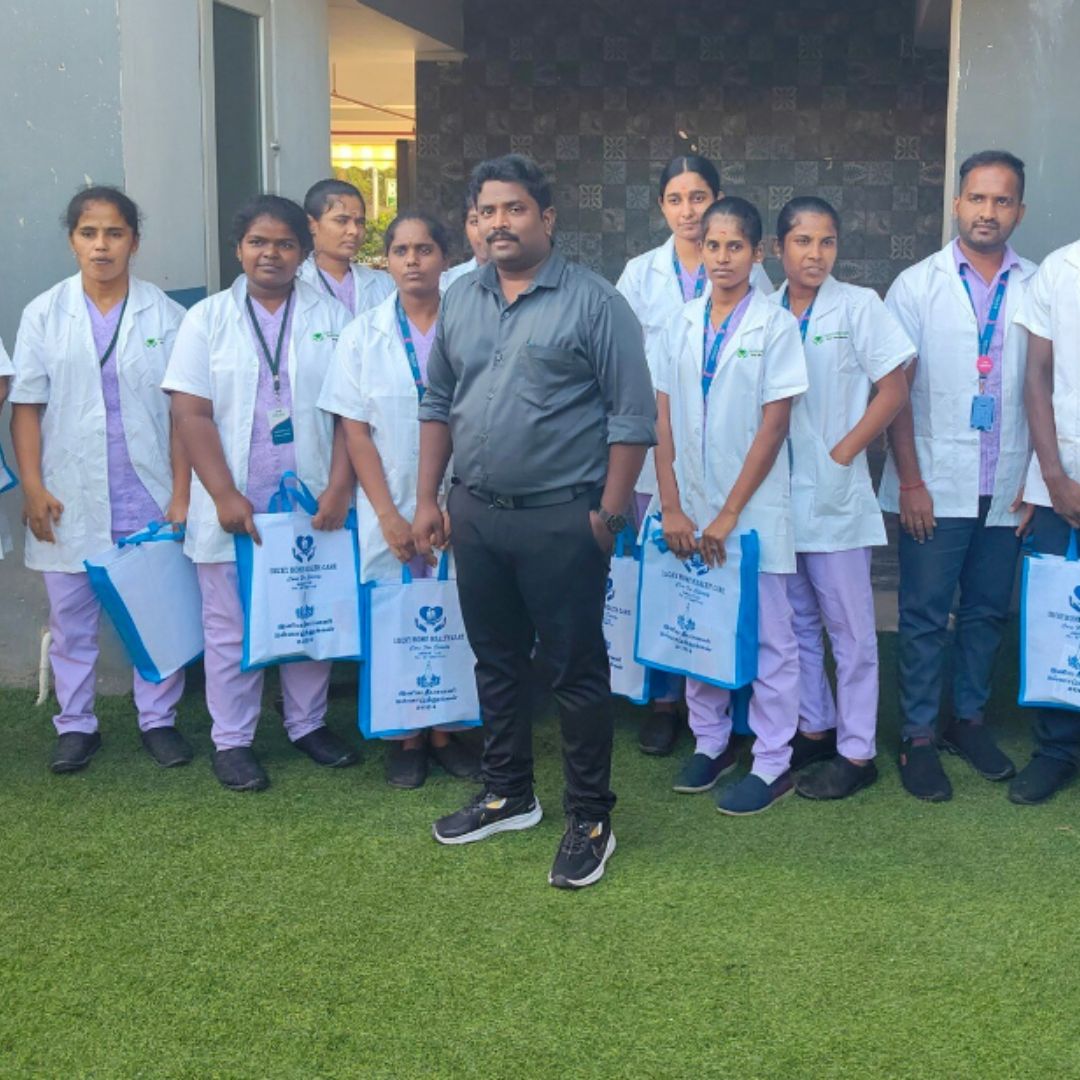 Lucky Home Health Care nurses setting up home medical equipment in Chennai for elderly patient recovery and nursing care.