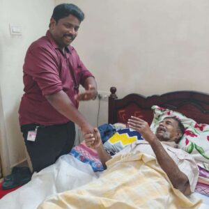 Lucky Home Health Care nurse monitoring vital signs of an elderly patient at home in Chennai.