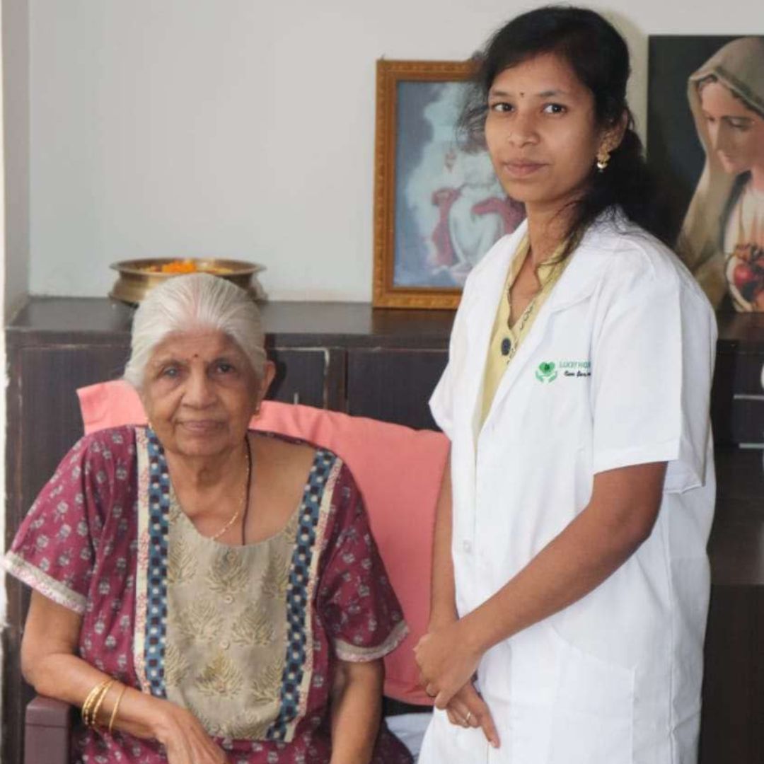 Doctor and caregiver from Lucky Home Health Care arriving at a patient’s home in Chennai for scheduled home health care service.